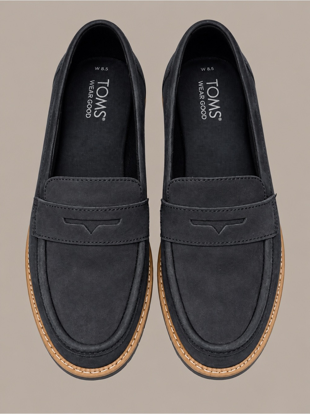 TOMS women’s navy blue Suede Penny Loafers with Tan Trim